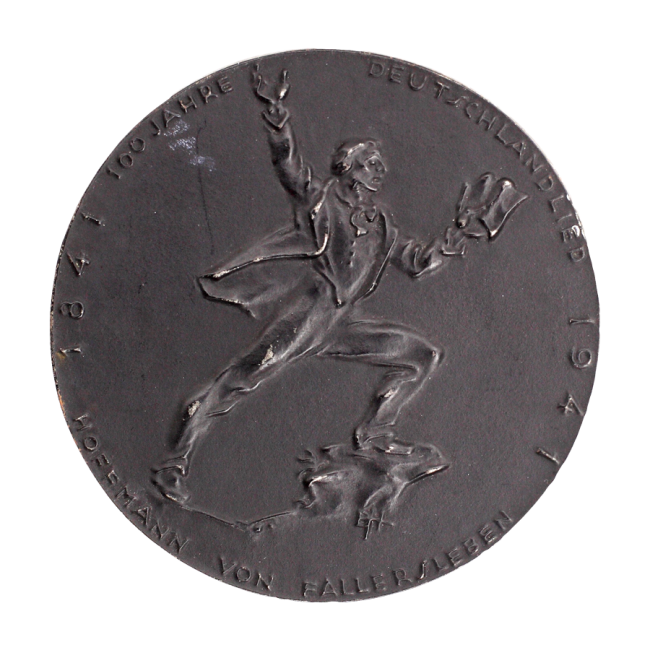 Plakieta z 1941 r., odlana okazji setnej rocznicy napisania przez Hoffmanna von Fallerslebena słów pieśni – hymnu Niemiec.